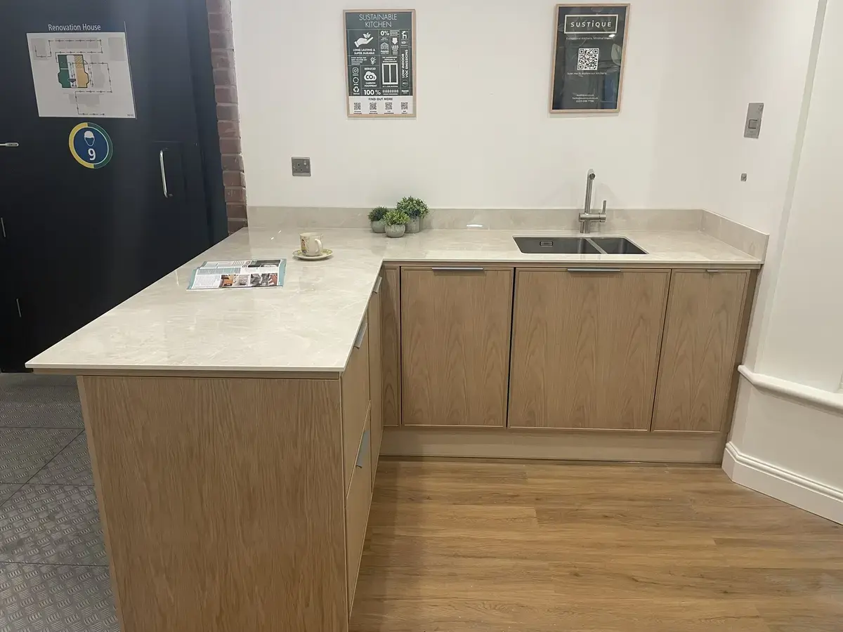 sustique supplied puustelli miinus kitchen in the nsbrc renovation house, peninsula, sink and tap